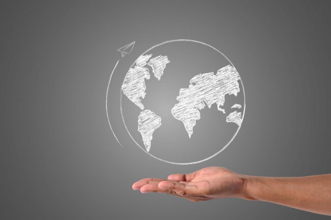 The world writes with white chalk is on hand, draw concept.